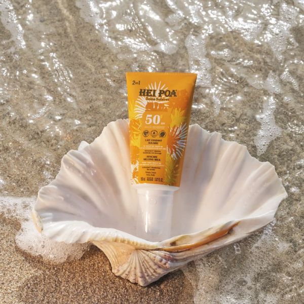 Hei Poa lait fondant solaire SPF50+ au Monoï de Tahiti hydratant et aux extraits végétaux Bio 150 ml